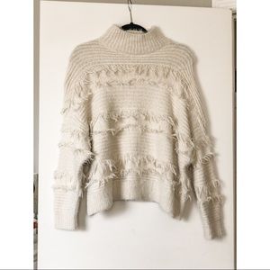 Mock neck sweater.